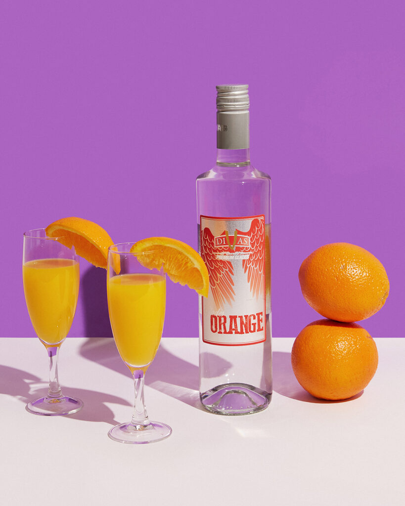 Orange Glades bottle with orange cocktails