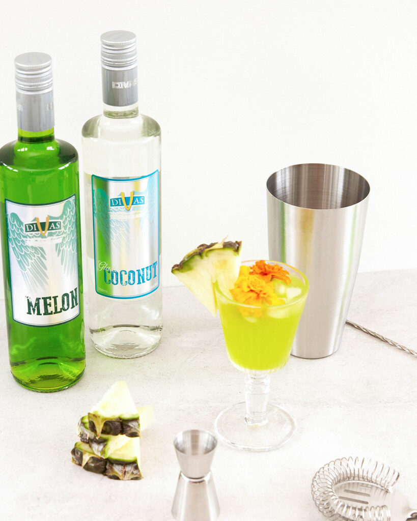 Melon and Coconut Glades bottles with pineapple cocktail