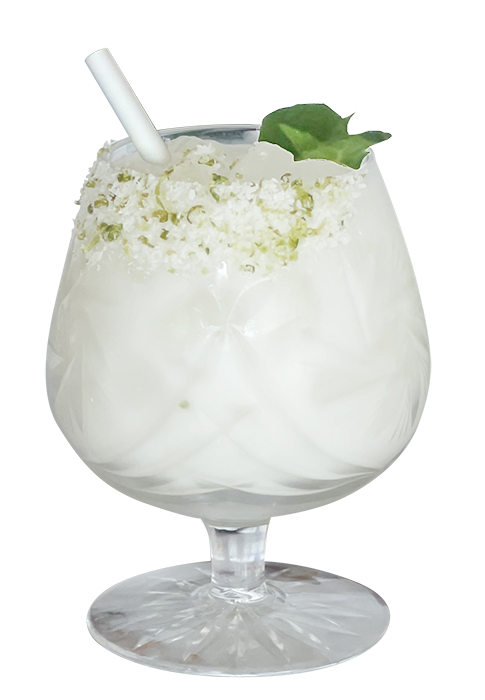 White coconut cocktail garnished with mint